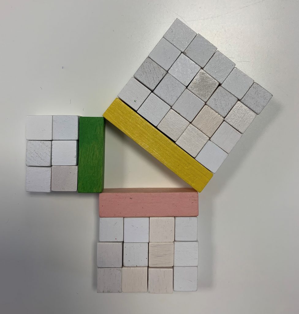 Demonstration of the Pythagorean theorem with Montessori strips.